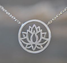 Fantastic and spiritual... This lotus necklace is part of our new spring collection. It is made of 925 sterling silver and has a simple lotus flower motif, which will be the perfect addition to your outfit. The lotus flower is the symbol of purity of heart, creativity, faithfulness and enlightenment. Love and life are also among the long list of meanings ascribed to this majestic flower. To give a precious feeling to your mother, girlfriend or yourself, this necklace would be the perfect gift choice. Be it as a Christmas gift, birthday gift, Mother's Day gift or even bridal jewelry. It is also available in a set with a bracelet, earrings and ring, making them the perfect gift idea for your loved ones. You can find the products under the following links: https://www.etsy.com/de/listing/1200 Spiritual Sterling Silver Nickel Free Charm Necklace, Spiritual Sterling Silver Nickel-free Charm Necklace, Delicate Sterling Silver Charm Necklaces As Gift For Mom, Hypoallergenic Silver Jewelry With Flower Pendant, Hypoallergenic Silver Flower Pendant Jewelry, Cadmium-free Sterling Silver Minimalist Jewelry, Cadmium-free Minimalist Sterling Silver Jewelry, Spiritual Silver Necklace Gift For Mom, Sterling Silver Flower Jewelry For Everyday