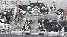 an aerial view of a large house with a basketball court in the front yard and lots of snow on the ground