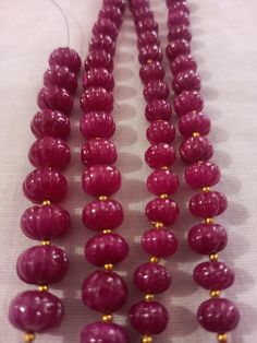 Ruby Pumpkin Natural Ruby Corundum Carving Pumpkin Beads Round Beads Gemstone String 1.Ruby Pumpkin shape 2. Ruby Corundum 3. 112 -carat weight - Approx -11 mm Size - 3.5 inch 9 piece String 4. 170 -carat weight - Approx - 10 mm Size - 6.5 inch 19 piece String 5. 167 -carat weight - Approx - 9 mm Size - 8 inch 25 piece String 6. 169 -carat weight - Approx - 8 mm Size - 10 inch 30 piece String 7, The necklace is with tassel because you can easily adjust your necklace length. 8. If you want any ch Traditional Rondelle Beaded Necklace With Polished Beads, Traditional Rondelle Beaded Necklaces With Large Beads, Traditional Rondelle Large Beads, Festive Faceted Oval Beads, Festive Oval Faceted Beads, Traditional Rondelle Gemstone Beads, Traditional Rondelle Gemstone Bead Jewelry, Festive Oval Gemstone Beads, Ruby Beaded Necklaces With Polished Round Beads