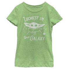 Is that a Baby Yoda?  It couldn't be because this little nugget of cuteness was born after the Battle of Yavin and Yoda was born almost 900 years before that!  But the similarity sure is striking isn't it?  You'll be the envy of the galaxy in this Star Wars The Mandalorian The Child Luckiest in the Galaxy Girls' Tee.  Bounty hunting may be a complicated profession but figuring out how to dress yourself in the morning just got a little easier. Galaxy T Shirt, Star Wars The Mandalorian, Star Wars Kids, Star Wars Fandom, The Mandalorian, How To Show Love, Girls Tees, Slim Fit Shorts, Star Wars Gifts