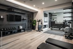 a home gym with treadmills and exercise equipment