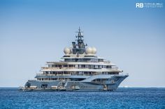 a large white boat in the middle of the ocean