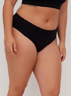 This hipster panty is soft and seamless under your clothes. Matching style(s): Search 10413917. Microfiber fabric. Medium coverage. Nylon/cotton/spandex. Wash cold; line dry. Imported plus size underwear. The best plus size women's seamless smooth mid-rise hipster panty panties in rich black made of seamless. You'll want to wear these basics every day. Black Seamless Micro-elastic Hosiery, Black Seamless Micro-elastic Bottoms, Black Fitted Seamless Bottoms, Black Seamless Brief Bottoms, Black Seamless Bottoms For Loungewear, Fitted Black Bottoms With Seamless Design, Black Elastic Seamless Bottoms, Basic Solid Soft Touch Bottoms, Basic Solid Bottoms With Soft Touch