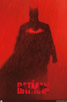 the dark knight rises poster with batman standing in the rain on it's back