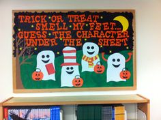 a book shelf with books on it and a trick for treat sign above the shelves