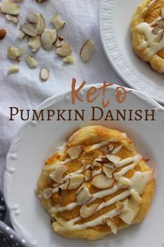 keto pumpkin cream cheese danish on a white plate with almonds next to it