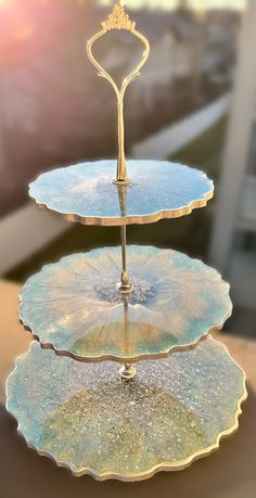 two tiered trays with water droplets on them