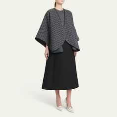 Valentino "Toile Iconographe" poncho in leather, virgin wool, and cashmere Open front  Leather trim  Made in Italy Luxury Women's Winter Poncho, Elegant Oversized Wool Poncho, Valentino Cape Coat, Luxury Wool Poncho, One Size, Elegant One-size Cashmere Poncho, Cashmere Poncho, Leather Trims, Valentino Garavani, Cashmere