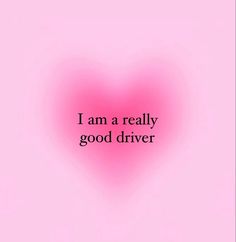 a pink heart with the words i am a really good driver