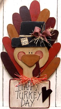 a turkey with a hat on it's head and words happy turkey day written below