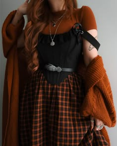 We’re off to get PSL’s, haunt Halloween stores, walk on crunchy leaves and pick pumpkins at the pumpkin patch!🎃 The theme is Pumpkins & Plaid 🧡🖤 Which outfit are you wearing 1-10?!? . I posted some of these over on Threads last week and realised pumpkins + plaids have been a common spooky ssn theme over the years, especially pumpkin plaid!! 🧡🖤☺️🍂 I’m finally heading to the pumpkin patch next week and deciding which outfit to wear! Lmk your faves in the comments!! . #pumpkinplaid #spookyseaso... Orange Goth Outfit, Alt Thanksgiving Outfit, October Outfits Halloween, Cute Halloween Outfits For Women, Dark Cottagecore Fashion, Disturbia Clothing, Madison Lewis