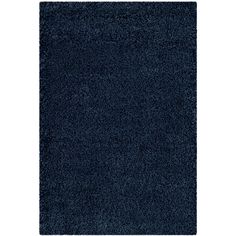 a dark blue rug is shown on a white background and it looks like an area rug