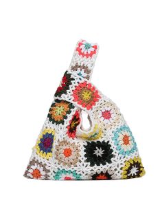 a crocheted purse with flowers on the front and bottom, in multicolors