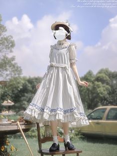 A striped sleeveless dress and chiffon blouse that will make you look like an innocent literary girl. The shoulder straps and hem are ruffled, and the waist can be tied with a ribbon. The skirt part sways gently as you walk, giving it an elegant atmosphere. 
 
 
 Delivery schedule 
 
 It will take about 1 month to 1 and a half months from order to delivery. 
 
 
 Item 
 
 One piece (*with corsage) 
 Blouse 
 
 
 Size 
 
 One Piece 
 
 S size 
 
 Length: 106.5cm 
 Bust: 89cm 
 Waist: 90cm 
 
 M s Cute Summer Vintage Dress With Doll Collar, Spring Striped Dresses With Ruffles, Summer Dresses With Ruffles And Doll Collar, Summer Garden Party Vintage Dress With Doll Collar, Cute Vintage Dress With Ruffles For Spring, Cute Spring Vintage Dress With Ruffles, Vintage Ruffled Doll Collar Dress For Summer, Vintage Dress With Ruffles And Doll Collar For Summer, Vintage Striped Summer Dresses