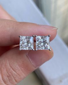 2 TCW Princess Cut Stud Earrings|VVS/VS Square Moissanite Studs|14K Gold Earrings|Princess Solitaire Studs|Screw Back Earring|Birth Day Gift ❤ EARRINGS DETAILS:- ✦ Brand: The American Gold House (TAGH) ✦ Handmade, high-quality item! ✦ Material: Solid 10K/14K/18K Gold, 950 Platinum and 925 Sterling Silver ✦ Diamond Type: Moissanite Diamond ✦ Diamond Cut: 5.5 MM Princess ✦ Diamond Weight: 1.0 CT (Each) ✦ Diamond Color: Colorless ✦ Diamond Clarity: VVS/VS   ------------------------------------------------------------------------------ 💎 Moissanite VS Diamond 💎 ------------------------------------------------------------------------------ 👉 Moissanite Maintain Their Clarity & Sparkle Throughout A Lifetime Just Like A Diamond. 👉Moissanites Are Actually More Brilliant (Sparkly) Than Diamonds Square Diamond Studs, Princess Cut Diamond Earrings, Princess Cut Earrings, Princess Cut Stud Earrings, Princess Cut Moissanite, White Gold Earrings Studs, Colorless Diamond, Princess Cut Diamond, Moissanite Earrings