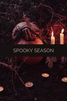 spooky season with pumpkins and candles