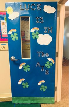 a door decorated with the words luck is in the air