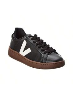 Introducing the VEJA Urca Sneaker, the must-have footwear for the environmentally conscious fashionista. Make a style statement while supporting a brand that's making a difference in the world. These black and white faux leather sneakers feature logo accents, a lace-up closure, and a lightly padded insole for all-day comfort. The rubber sole provides traction for any urban adventure. Imported and available in European sizes, be sure to reference the size chart for US conversions. Step out in sty Modern Lace-up Sneakers For Fall, Spring Logo Lace-up Sneakers, Fall Everyday Sneakers With White Sole, Spring Lace-up Sneakers With Logo, Modern Fall Sneakers With Rubber Sole, Spring Low-top Sneakers With Logo, Everyday Fall Sneakers With Gum Sole, Fall Everyday Sneakers With Gum Sole, Fall Gum Sole Lace-up Sneakers