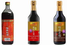 three bottles of different kinds of wine on a white background with chinese writing in the bottom right corner