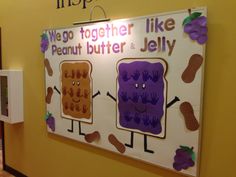 a sign that says we go together like peanut butter and jelly on the side of a wall