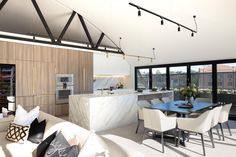 a modern kitchen and dining room are shown in this artist's rendering, with large windows overlooking the city