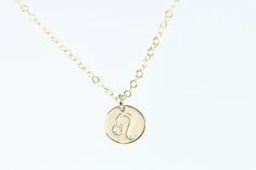 Astrology sign necklace - This dainty gold necklace features a petite but thick 14k gold filled disc with your chosen astrology symbol, suspended from 14k gold filled cable chain. This minimalist necklace makes a symbolic birthday gift! Arrives gift boxed in Sea and Cake packaging. *Length on model is 16 inches *Gold disc is 9mm and 20g thick. *Handmade with love in the USA *All components are 14k gold filled which will last a lifetime, unlike gold plated. *Need a thicker chain? Substitute rolo Gold Minimalist Zodiac Charm Necklace, Gold Dainty Zodiac Sign Charm Necklace, Delicate Wedding Necklace, Gold Necklace Delicate, Tortoise Shell Necklace, Bird Skull Jewelry, Raven Skull Necklace, Acrylic Monogram, Leo Necklace