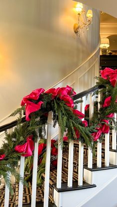 christmas decorations on the banisters and stairs