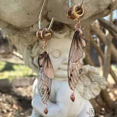 Our new stunning Fairy grunge fairy dangle tunnels are specially designed for those who have stretched ears. Handmade 2 Color Choices: Woodland Brown or Silver 100% stainless steel rose gold/Silver color screw back gauges Sizes: 0G, 00G, 1/2, 5/8 (8, 10, 12, 16 mm) Double plastic wings Hand painted/glittered Woodland Brown version: Copper wire, aqua blue & copper crystals Silver version: Clear crystals (with rainbow luster) and blue crystals Earring length 2.25" drop (3 inch total length) Made t Pretty Gauge Earrings, Dangle Gauge Earrings, 0g Stretched Ears, Ear Gauges Aesthetic, 00g Stretched Ears, Gauges Aesthetic, Stretched Ears Aesthetic, Woodland Fairy Aesthetic, Pretty Gauges