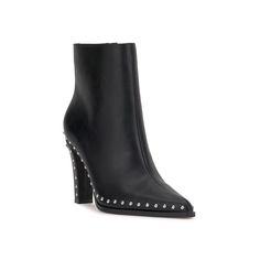 a pair of black high heeled boots with rivets on the side and an open toe