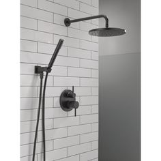 a shower head with thermostaer and hand held shower faucet in black