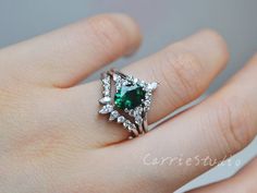 Beautiful design oval emerald ring set, made of 925 sterling silver, plated with white gold.Main Stone: Lab Created EmeraldMeasurement:  6*8 mmCut: OvalCutSide Stone: CZBand Width: Approximately 1.7 mmMatching Band:Stone on the band: CZBand Width: Approximately 1.6 mmCS0325Custom order accepted, if need different stone or material, just feel free to contact.:)Home page: https://www.etsy.com/shop/CarrieStudio?ref=seller-platform-mcnav Silver Emerald Ring With Marquise Cut, Stackable Oval Emerald Ring In Silver, Fine Jewelry Silver Emerald Ring With Marquise Cut, Silver Emerald Marquise Ring, Fine Jewelry Marquise Cut Silver Emerald Ring, Marquise Cut Emerald Jewelry In White Gold, Unique Silver Oval Emerald Ring, Silver Marquise Emerald Ring, Oval Emerald Ring With Sterling Silver Setting