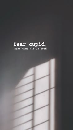 a window with the words dear cupid next to it