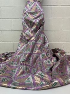 Exotic Bazin Brocade/Bazin Jacquard in Metallic Gold, Purple & Sage Green Embossed Geometric Design- 5 Yards PieceIt's perfect for All kinds of Gurmants, dresses, tops, skirts, wedding, prom Dresses, Decoration & upholstery. Color: Metallic Gold, Purple & Sage Green Width: 58"-60" (Inches) Sell by: 5 Yards Piece (180") Material: 100% Poly Shipping & Shop Policy:  * If you place Order before 4pm, we ship your order at same day. We ship by FedEx or USPS Priority mail. It takes about 1-3 days deliv Purple Sage, Metallic Gold, Geometric Design, Sage Green, Priority Mail, Gold Metal, Prom Dresses, Yard, Craft Supplies