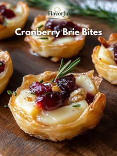 cranberry brie bites on a wooden cutting board