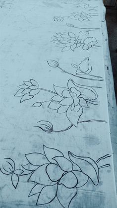 the table cloth has flowers drawn on it