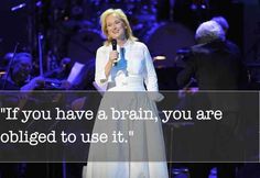 a woman standing in front of a microphone with an ad on the side saying if you have a brain, you are abridged to use it