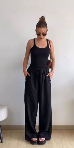 black linen pants outfit summer outfits casual spring outfits outfit ideas Black Linen Flare Pants Outfit, Outfit For Black Pants, Black Lenin Pants Outfit, Wide Leg Drawstring Pants Outfit, Dark Linen Pants Outfit, Black Linen Pants Outfit Spring, Linen Pants Casual Outfit, Black Wide Leg Linen Pants Outfit Summer, Black Effortless Pants Outfit