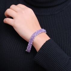 Turn heads with the vibrant color and attention-getting look of this oval-shaped purple amethyst triple-row line bracelet in silver. Fashioned in sterling silver Sideways 5.0 x 3.0mm oval-shaped bright purple amethyst shine along the brick-patterned triple-row design. This 7.5-inch bracelet secures with a box clasp. Bracelet In Silver, Silver Jewelry Design, Box Clasp, Bright Purple, Purple Amethyst, Sterling Silver Bracelets, A Box, The Row, Silver Jewelry