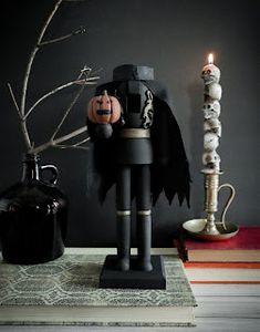 a halloween decoration with candles and decorations