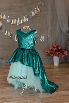 Little Mermaid Dress, Mermaid Outfit For Girls, Ariel Dress Princess sequin tutu dress is designed specially for your loveliest daughter. Lovely dress in turquoise color sequins and full tulle skirt. Dress has train and open back. Tutu hi lo dress is perfect for any special occasion in life of your daughter - birthday, party, wedding as flower girl and any other event. With this dress your daughter will receive many compliments. Look at my other dresses in my shop https://www.etsy.com/shop/Match Blue Mermaid Hem Dress For Pageant, Green Mermaid Dress For Wedding, Princess Mermaid Dress For Pageant, Princess Style Mermaid Dress For Pageants, Princess Style Mermaid Dress For Pageant, Blue Mermaid Dress For Pageant, Blue Mermaid Dress For Pageants, Fitted Green Gown For Dress-up Occasions, Fitted Mermaid Princess Dress For Dress-up