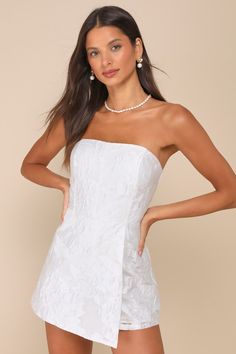 You'll always bring the glamour when you arrive at the event in the Lulus Sensational Excellence White Jacquard Strapless Skort Romper! This fun and flirty romper has a structured, woven fabrication that boasts a floral jacquard as it shapes a straight neckline (with hidden no-slip strips) and a bustier-inspired bodice (with supportive side boning). High, fitted waist sits atop cute shorts with a trendy skort overlay at the front. Hidden back zipper/clasp. Fit: This garment fits true to size. Le Sorority Semi Formal Dresses, Romper Dress Formal, Trendy Skort, White Hoco Dress, Winter Mini Dress, Wedding Rompers, White Mini Dresses, Bridal Romper, Hoco Inspo