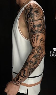 a man with a tattoo on his arm