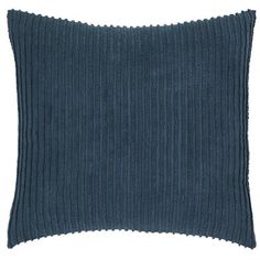 a blue pillow with pleated edges