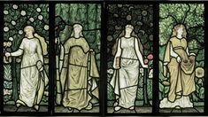 three stained glass panels depicting women and flowers