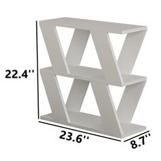 a white book shelf with three shelves on each side and measurements for the top one