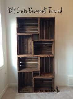 a bookcase made out of wooden crates in a room