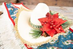 Get your mini trimmed out for some Christmas Cowboy shenanigans!  A cream colored cowboy hat is trimmed-out with snow dappled foliage. The shawl is made from retro Christmas patterned calico and edged with smart trim and fringe. The tail piece features a matching calico pattern and finished with festive ribbons. The hat and tail piece attach easily with alligator clips. All our costumes are handmade with heart in the 'holler. If you are ordering outside the US we charge a fixed shipping rate but Christmas Cowboy Hat, Christmas Cowboy, Fancy Christmas, Cowboy Girl, Fringe Shawl, Cowboy Christmas, Aesthetic Christmas, Alligator Clips, Christmas Costumes