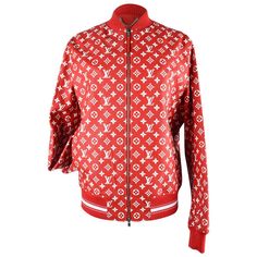 Guaranteed authentic highly coveted and sought after Louis Vuitton Supreme X Very Limited Edition LV Monogram leather bomber jacket. Red fabric around neck, cuffs, and hips with SUPREME at rear. Logo embossed front zip. The collection is sold out and no longer available in the store. This fabulous jacket is easily unisex. Comes with garment bag and box. NEW or NEVER WORN. final sale SIZE 50 JACKET MEASURES: LENGTH 27.5" UNDERARM to UNDERARM 23" SHOULDER 19.5" HIP 18" SLEEVE 27" CONDITION: NEW or Supreme Jacket, Louis Vuitton Supreme, Leather Varsity Jackets, Armani Jacket, Boucle Coat, Louis Vuitton Limited Edition, Pre Owned Louis Vuitton, Reversible Scarf, Greek Revival