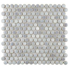 a white tile with circles on it