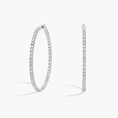 An elevated twist on a timeless piece, these 14k white gold diamond hoop earrings showcase 7 ct. tw. of French pave-set round diamonds intricately arranged in an eternity-inspired design. Diameter of hoop measures 2 Inches. Wedding Ring Guide, Gold Diamond Hoop Earrings, Platinum Rose Gold, Engagement Rings Marquise, Gold Rings Fashion, Gold Pearl Necklace, Ladies Diamond Rings, Diamond Shop, Diamond Hoop Earrings